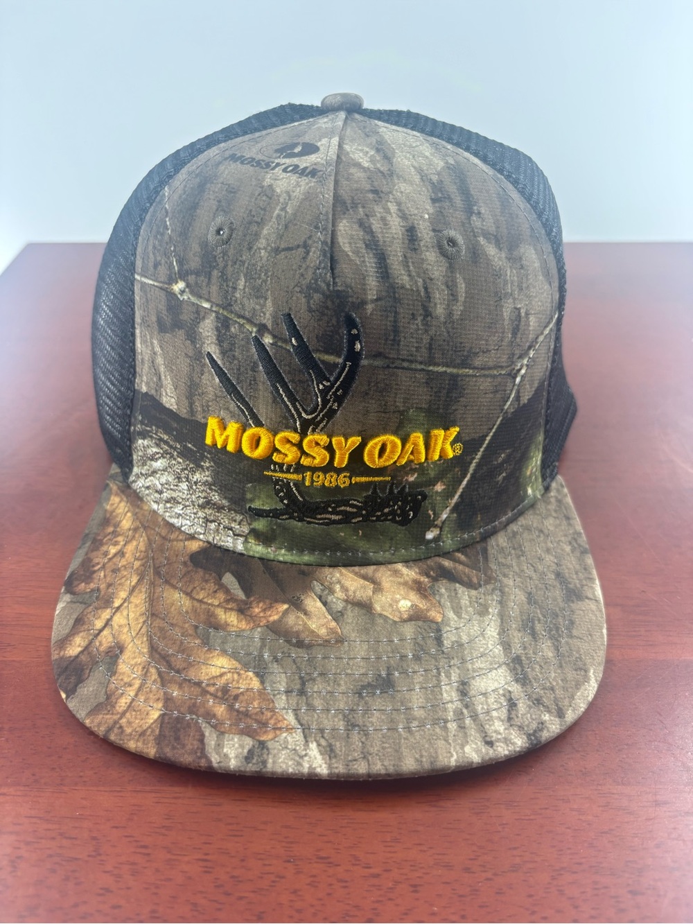 Mossy Oak Camo Trucker Hat with Yellow Logo